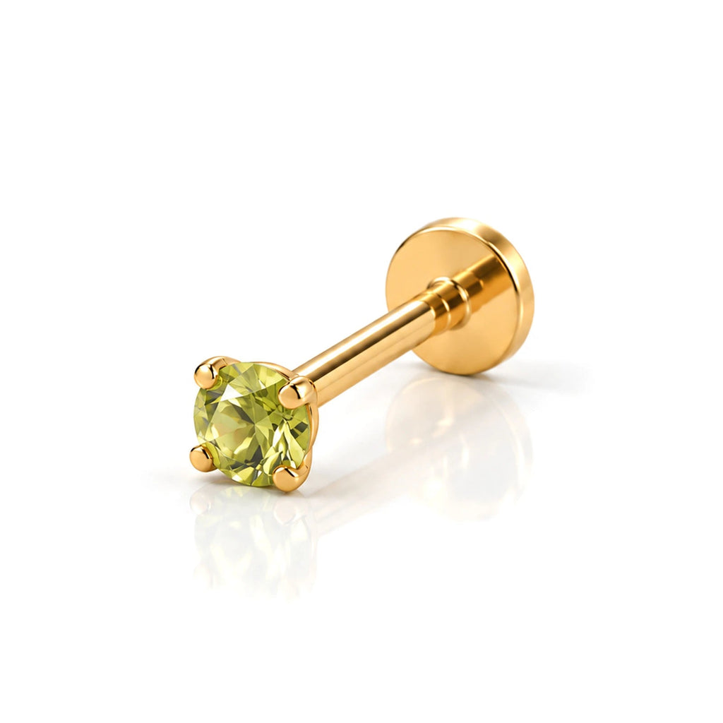 June Griffe Canary Yellow piercing in yellow titanium
