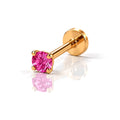 June Griffe Coral Pink piercing in yellow titanium