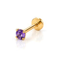 June Griffe Deep Purple piercing in yellow titanium