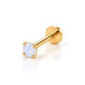 June Griffe Glacier Blue piercing in yellow titanium