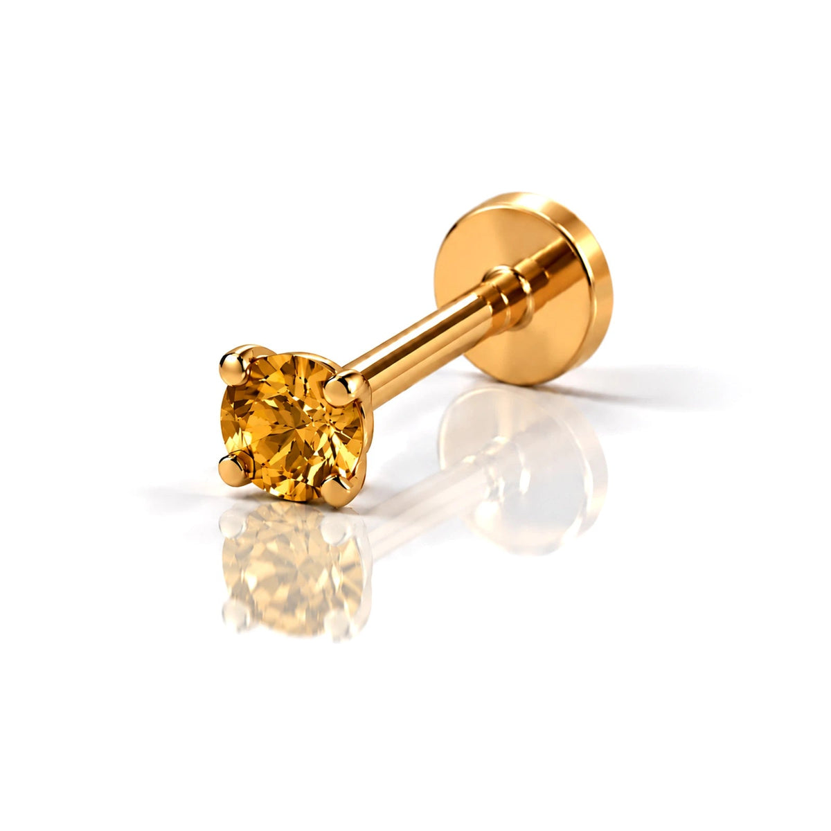 June Griffe Tropical Orange piercing in yellow titanium